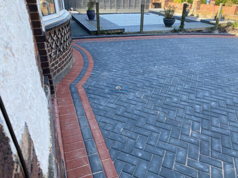 Charcoal Paved Driveway with Terracotta Border in Connah's Quay
