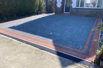 Charcoal Paved Driveway with Terracotta Border in Connah's Quay