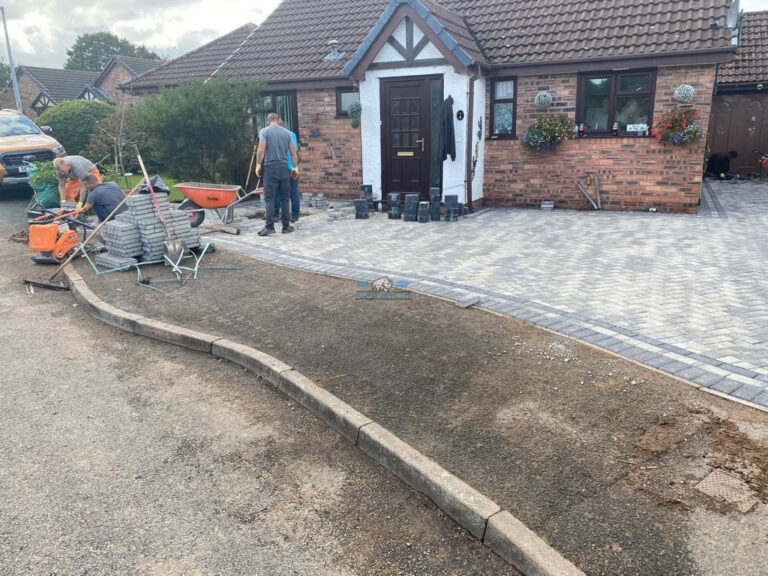 Silver Grey Block Paved Driveway with Double and Single Charcoal Border in Flint