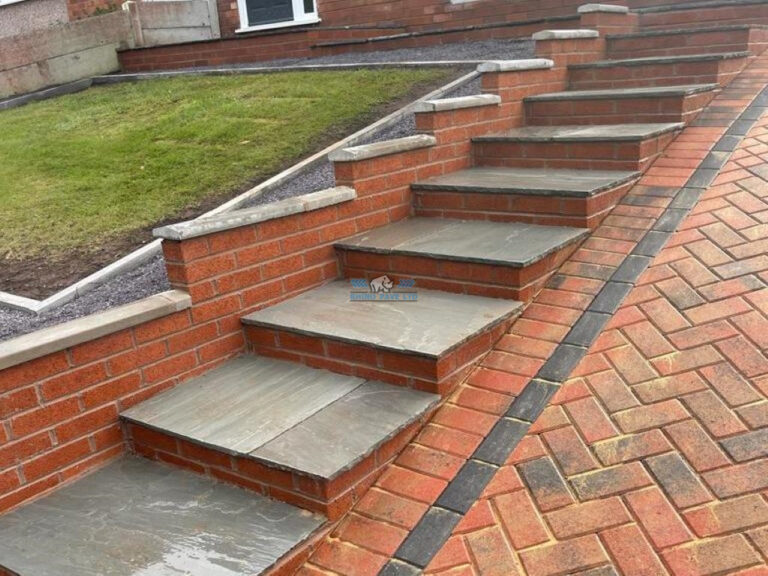 Block Paved Driveway with Retaining Wall and Indian Sandstone Steps in Holywell