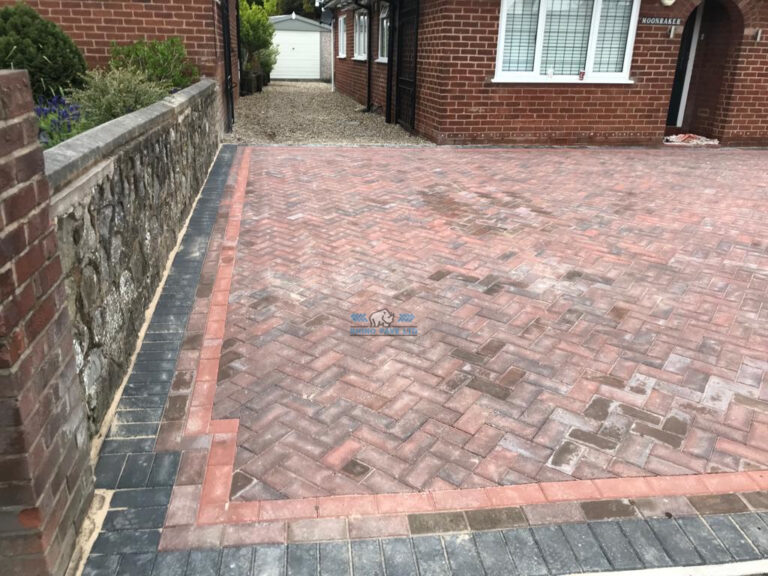 Brindle Paved Driveway with Terracotta and Charcoal Edging in Bagillt, Flintshire