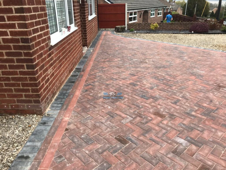 Brindle Paved Driveway with Terracotta and Charcoal Edging in Bagillt, Flintshire
