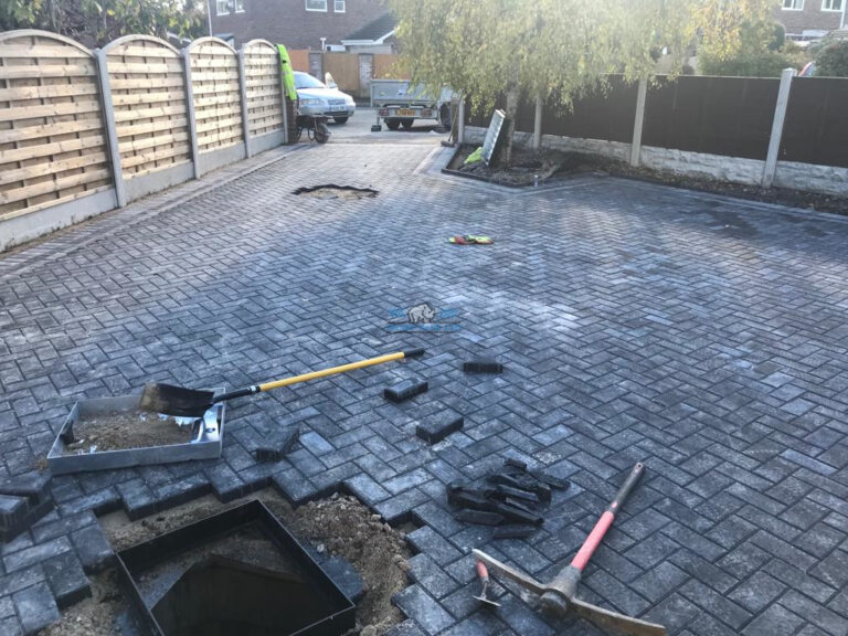 Charcoal Block Paved Driveway with Flowerbeds in Penyffordd, Flintshire