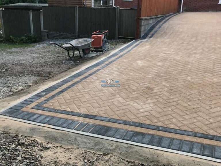 Driveway with Buff Block Paving and Charcoal Edging in Greenfield, Flintshire