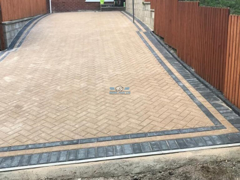 Driveway with Buff Block Paving and Charcoal Edging in Greenfield, Flintshire