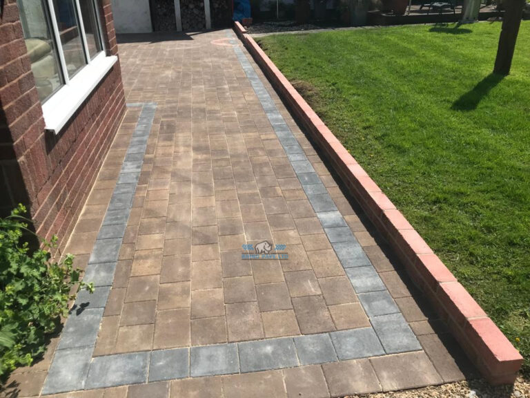 Patio with Modena Paving and Brick Retaining Wall in Flint Mountain, Flintshire