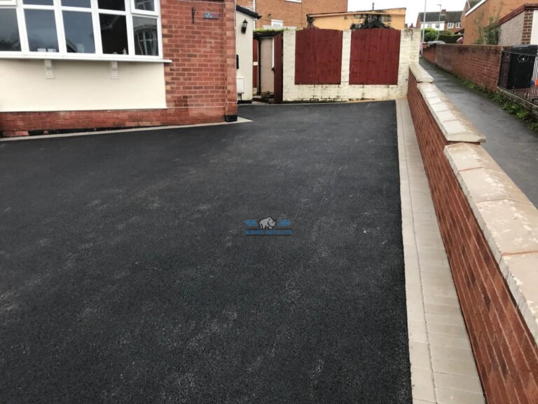 Tarmac Driveway with Natural Grey Apron and New Retaining Wall in Flint, Flintshire