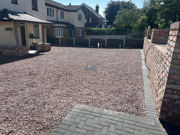 Gravelled Driveway with Charcoal Edging, Apron and Retaining Wall in Deeside, Flintshire