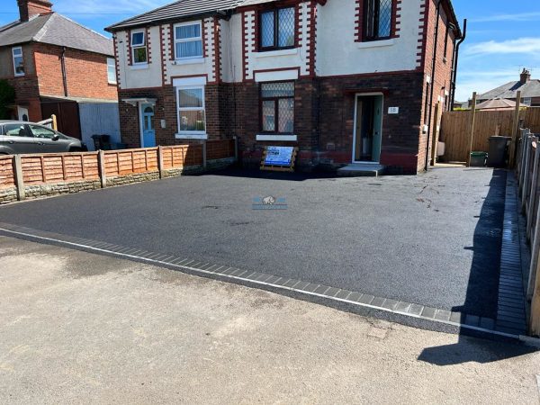 New tarmac installation on a driveway in Llangollen