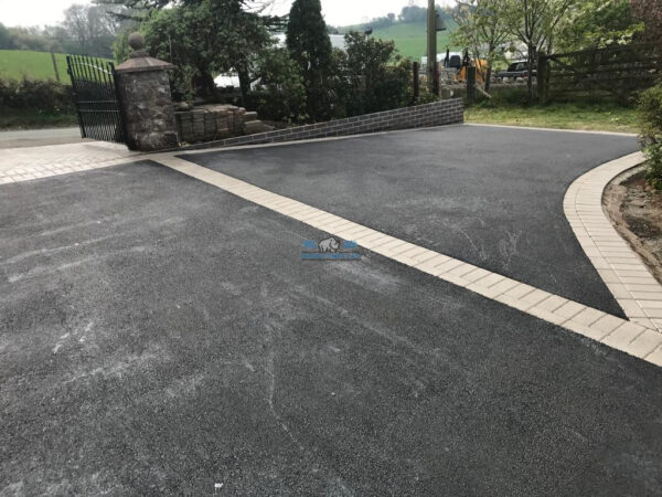 Tarmac driveway with natural grey paved apron and edging in holywell flintshire 9.jpeg
