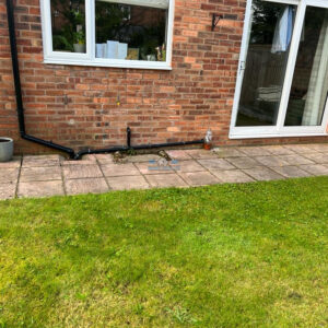 Indian Sandstone Patio with Charcoal Brick Edge in Chester, Cheshire