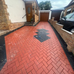 Resin-Bound Driveway with Charcoal Edging in Prestatyn, Denbighshire