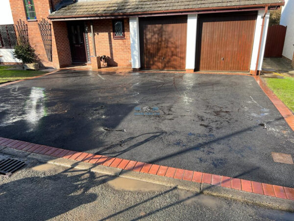 Rhino pave tarmac driveway with red brick edging in lixwm flintshire 6.jpeg